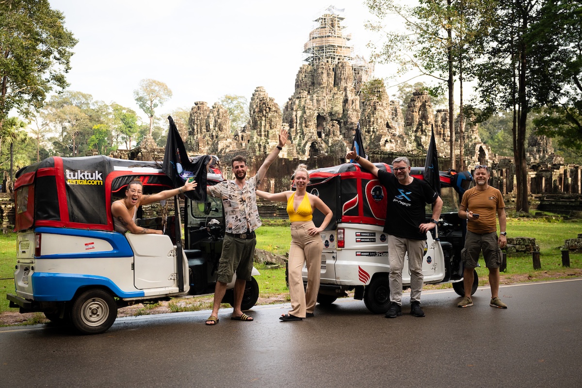 tuktuks rickshaws three wheelers in front of Angkor Wat